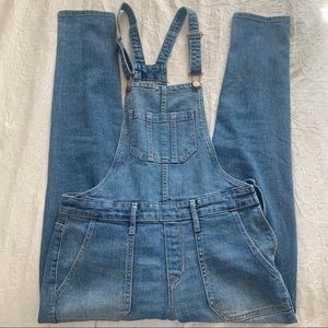 Light wash distressed overalls